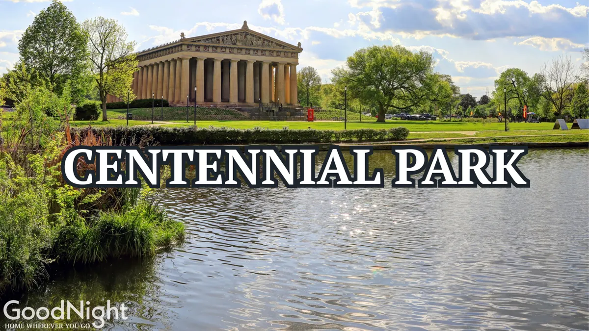 This image presents the Parthenon replica in Centennial Park, framed by a reflective water surface and lush green trees. The tranquil scene is inviting for anyone considering a peaceful stroll, a picnic, or a bit of sightseeing just minutes from the property.